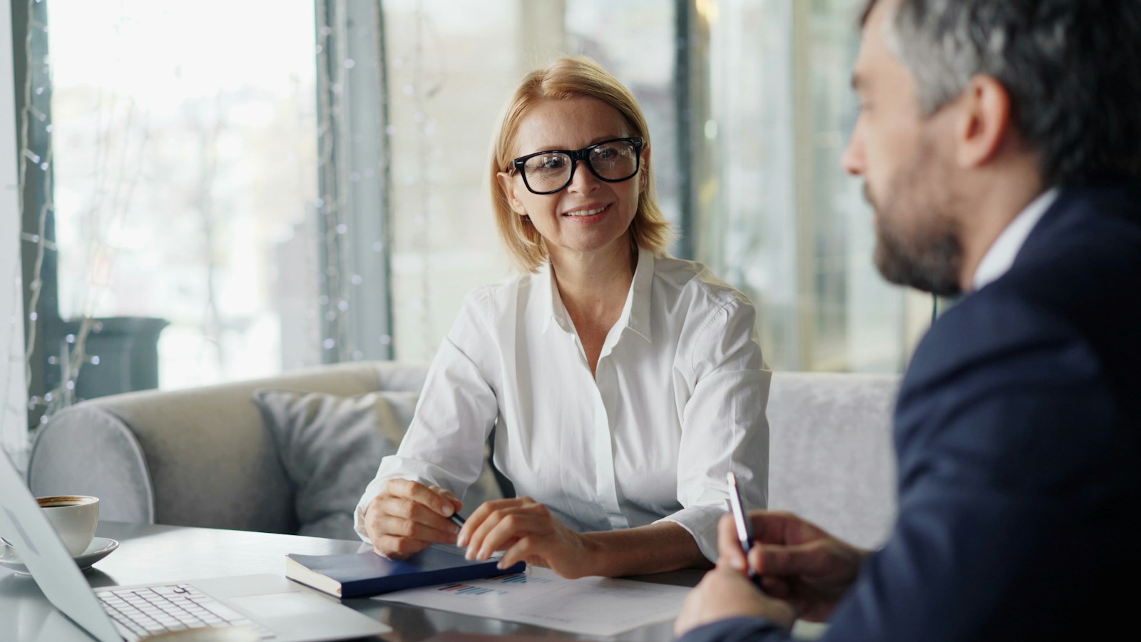 Elite Business Capital funding advisor consulting with a business owner